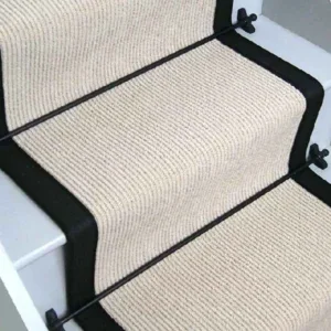 Rib-Champagne-stair-runner-with-black-edging-and-black-stair-rods