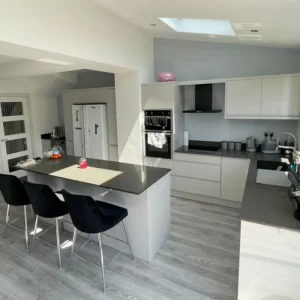 Grey Floorboard in kitchen